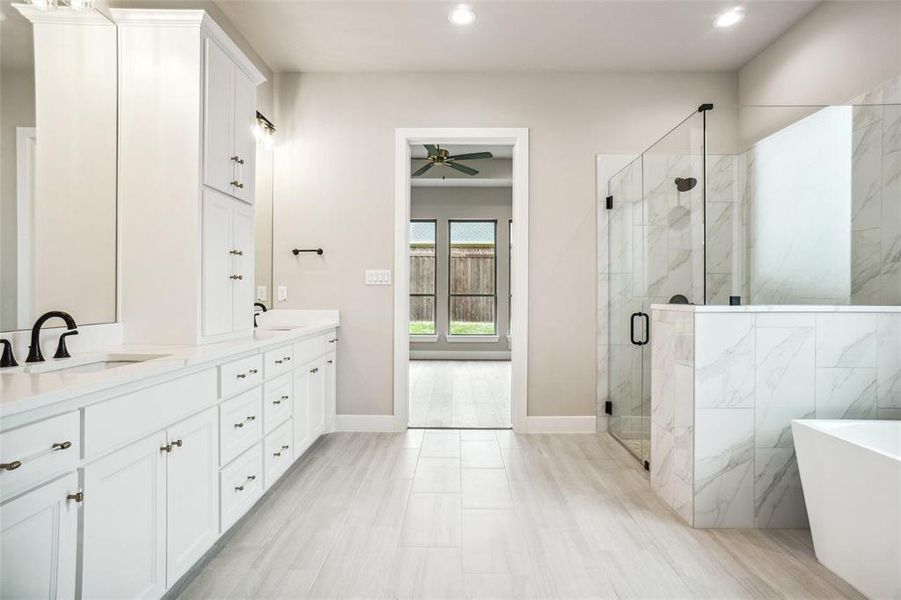 Large walk in shower has bench seating and shampoo niche Large walk in shower has bench seating and shampoo niche