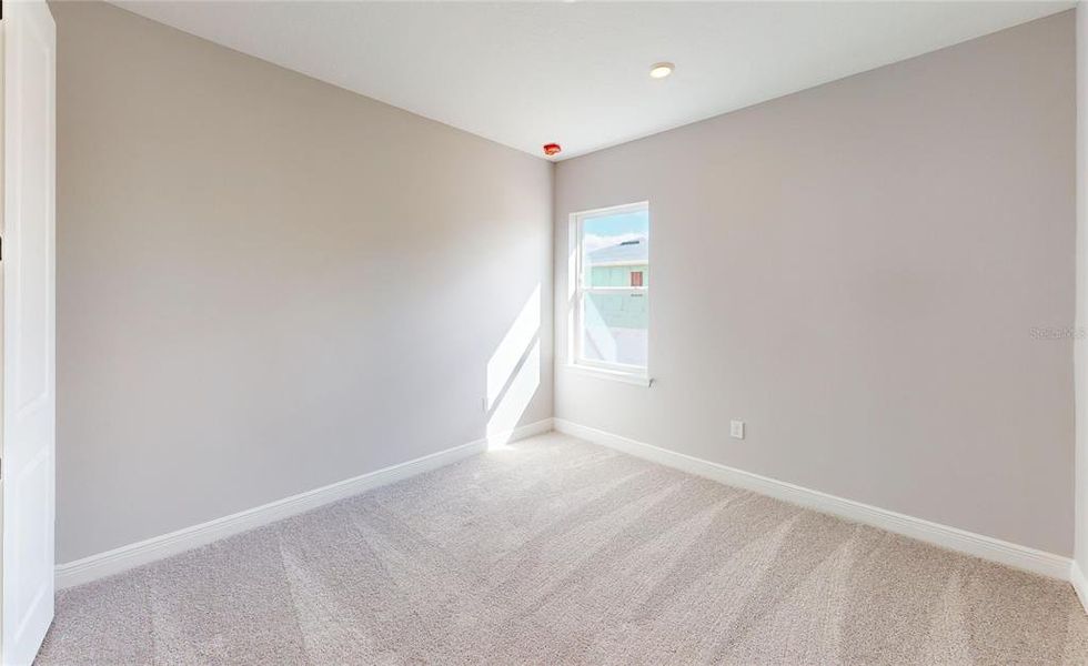 Spacious, unfurnished interior of a new home in Laureate Park, Orlando (Image 26).