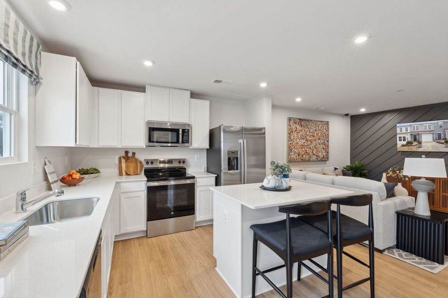 Representative furnished interior of a home built from the The Rutledge by Stanley Martin Homes in Essence at Trinity Townhomes, Columbia (Image 45).