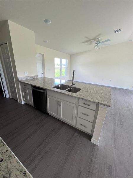 Furnished interior view inside a new home in , Dunnellon (Image 7).