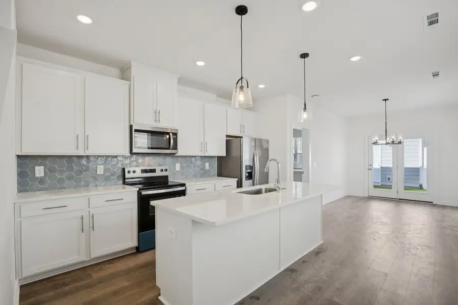 Furnished interior view inside a new home in Greystone - Vista Townhomes, Smyrna (Image 5).