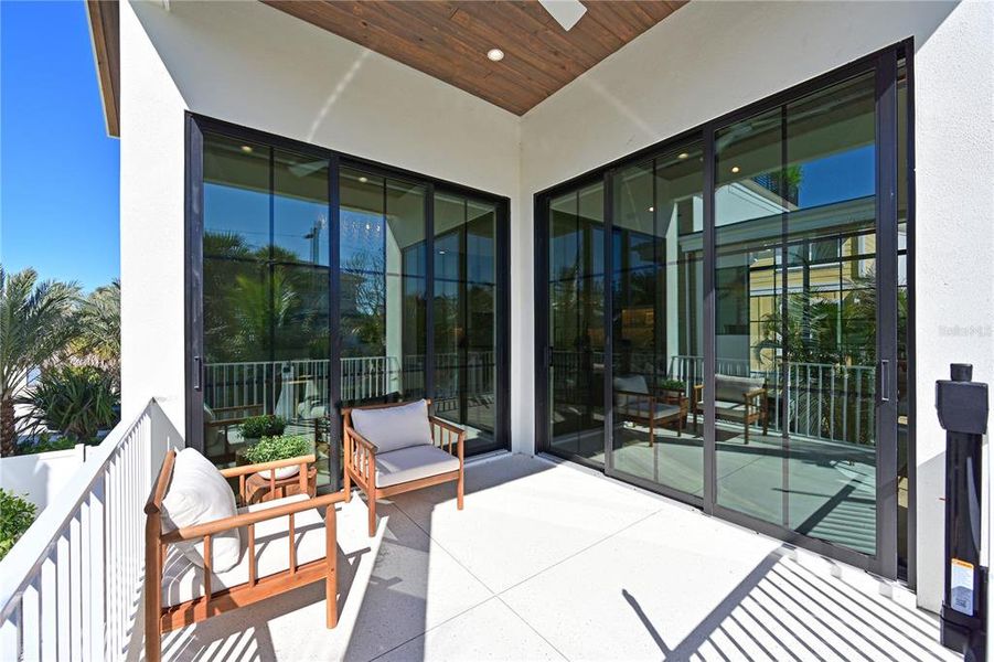 Exterior details and patio area of a home in , Anna Maria (Image 29).