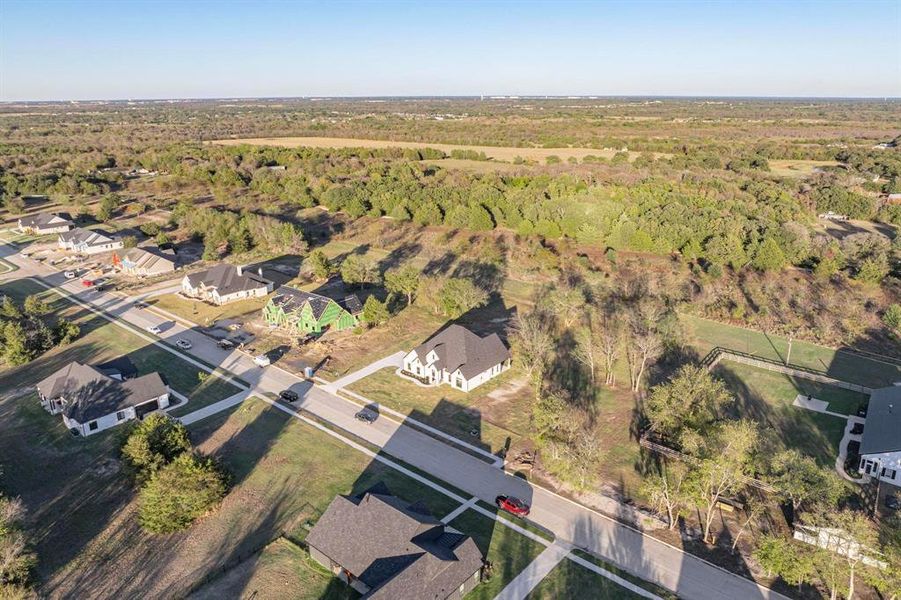 Bird's eye view with a forest view and a residential view