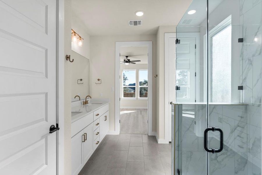 Furnished interior view inside a new home in Terrace Collection at Heritage, Dripping Springs (Image 12). Furnished interior view inside a new home in Terrace Collection at Heritage, Dripping Springs (Image 12).