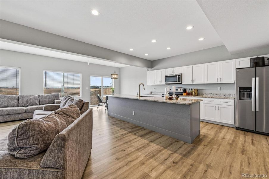 Open concept kitchen with large kitchen island. Open concept kitchen with large kitchen island.