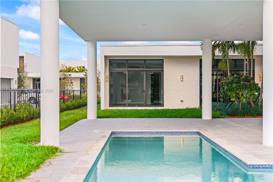 Exterior details and patio area of a home in , Weston (Image 3).