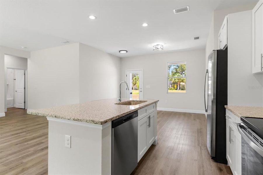 Furnished interior view inside a new home in , Port Charlotte (Image 6). Furnished interior view inside a new home in , Port Charlotte (Image 6).