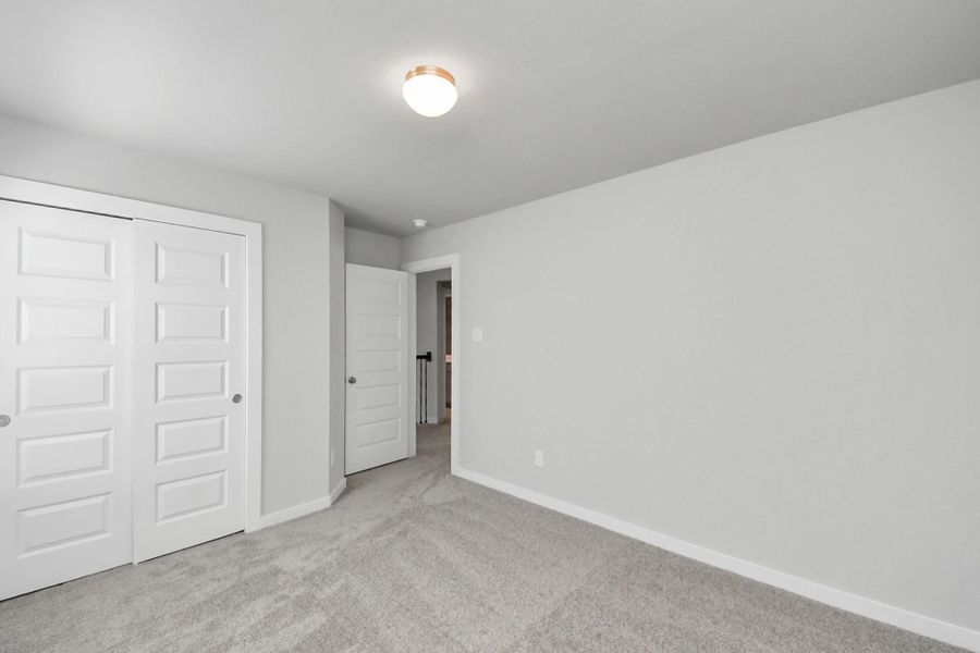 Generously sized secondary bedrooms featuring spacious closets, soft and inviting carpeting underfoot, large windows allowing plenty of natural light, and the added touch of privacy blinds for your personal retreat. Generously sized secondary bedrooms featuring spacious closets, soft and inviting carpeting underfoot, large windows allowing plenty of natural light, and the added touch of privacy blinds for your personal retreat.