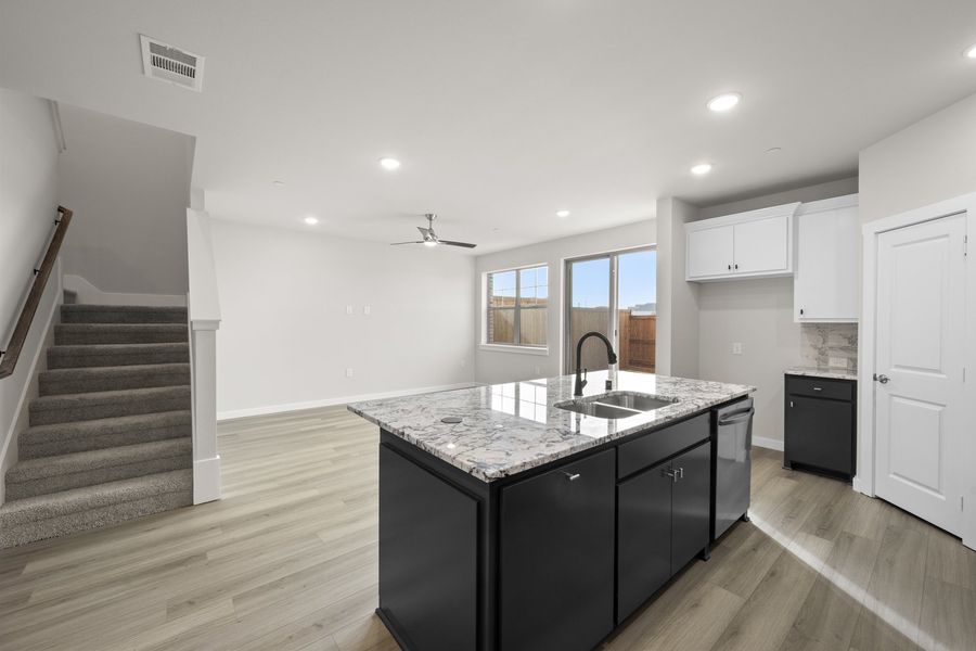 Furnished interior view inside a new home in Wildridge, Oak Point (Image 9).
