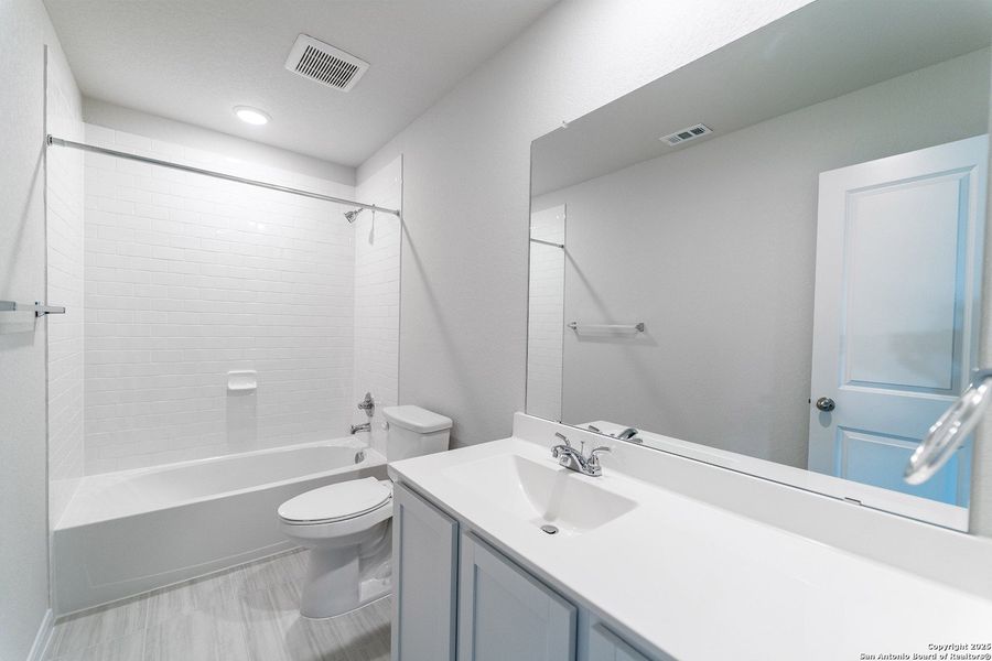 Furnished interior view inside a new home in Hunter's Ranch, San Antonio (Image 8).