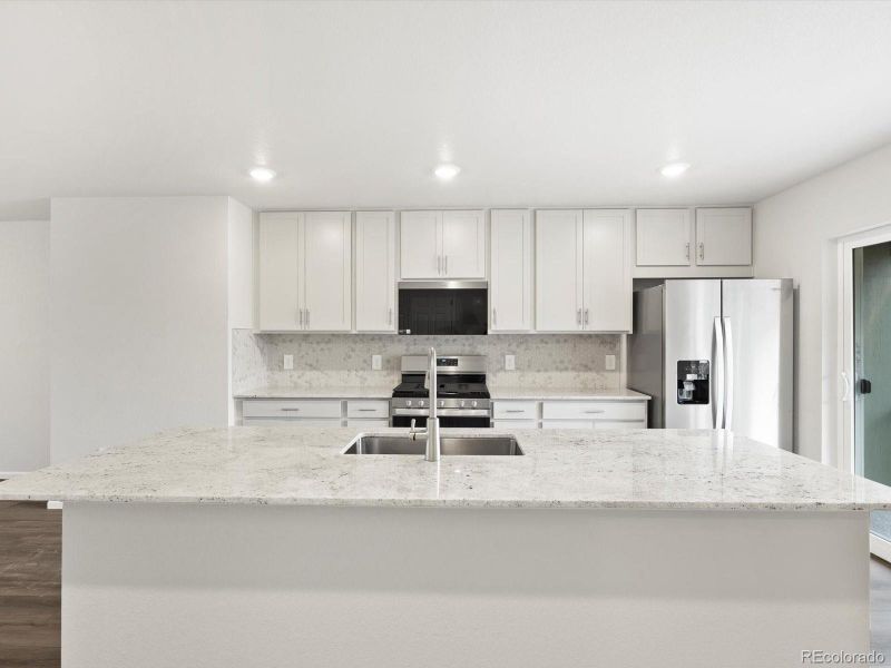 Furnished interior view inside a new home in Three Hills, Morrison (Image 6).