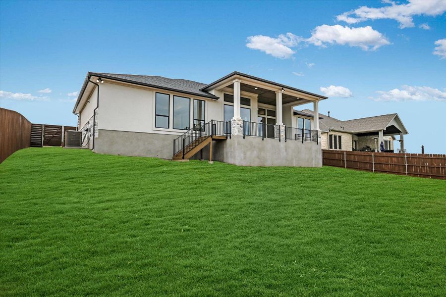 Exterior details and patio area of a home in Riverstone, Georgetown (Image 18).