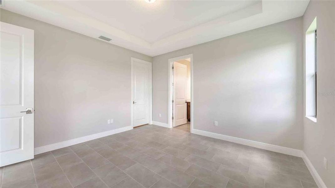 Spacious, unfurnished interior of a new home in Woodland Preserve, Parrish (Image 26).