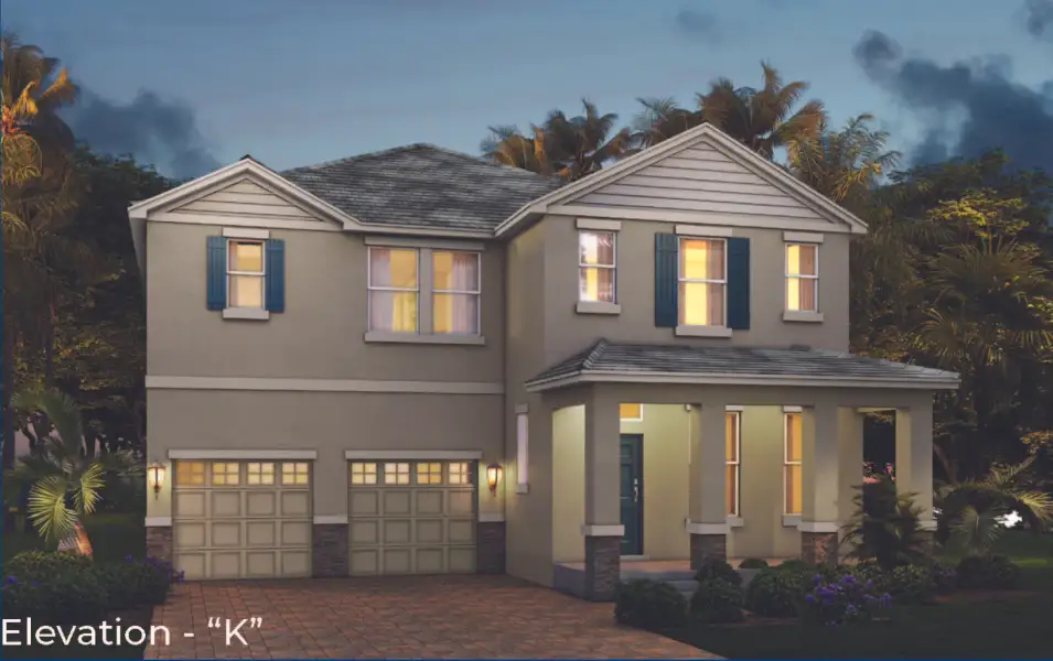 Front exterior of a new home in Waterleigh, Winter Garden, FL, highlighting curb appeal (Image 2). Front exterior of a new home in Waterleigh, Winter Garden, FL, highlighting curb appeal (Image 2).