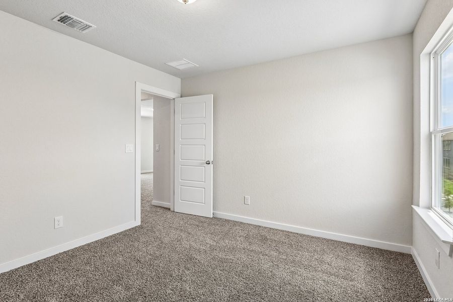 Spacious, unfurnished interior of a new home in Highland Ridge, New Braunfels (Image 13).