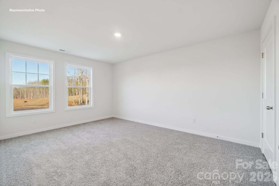 Spacious, unfurnished interior of a new home in Sanctuary at Southgate, Indian Trail (Image 32).