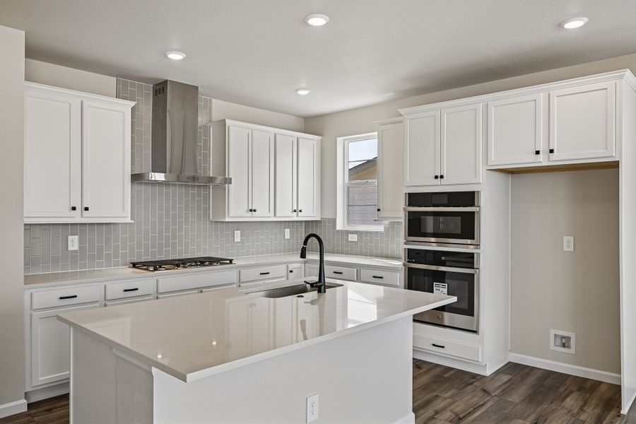 Furnished interior view inside a new home in The Aurora Highlands, Aurora (Image 4).