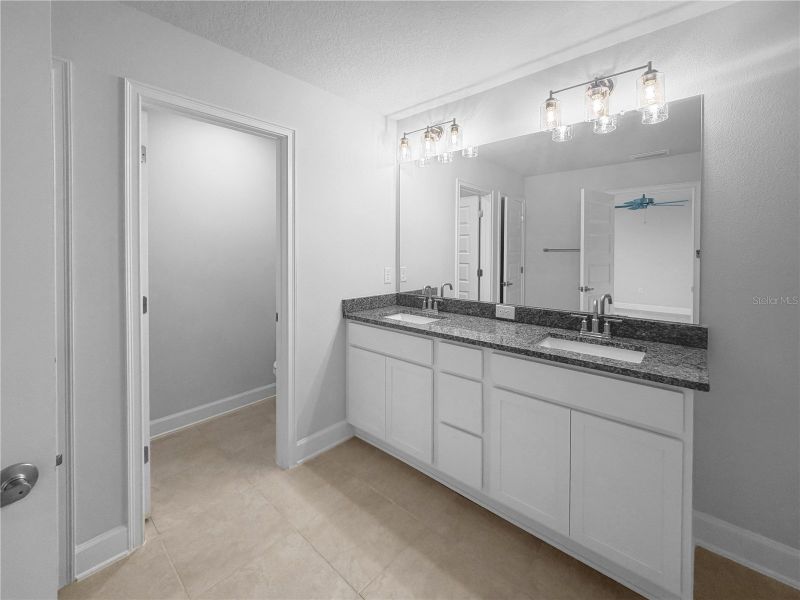 Furnished interior view inside a new home in Harmony Central, St. Cloud (Image 7).