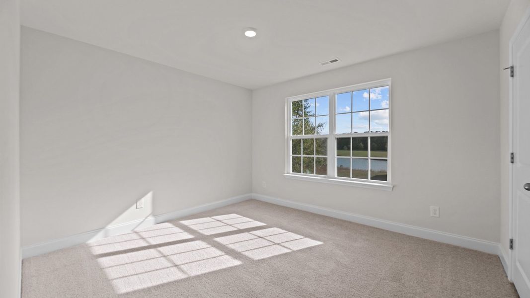 Spacious, unfurnished interior of a new home in Villa Grande, Winterville (Image 18).