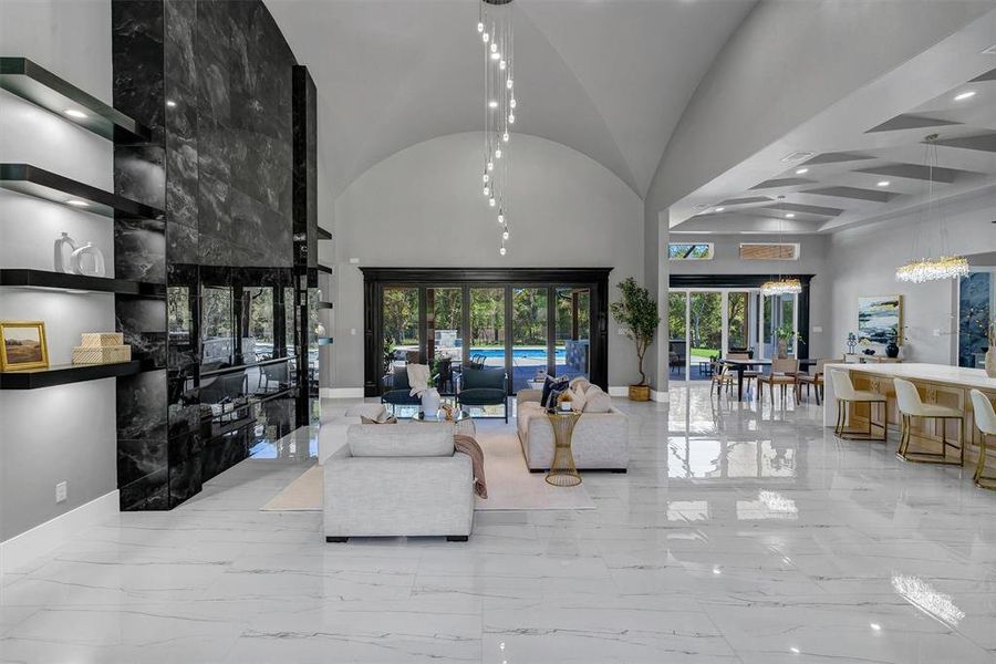 Living room featuring a towering ceiling