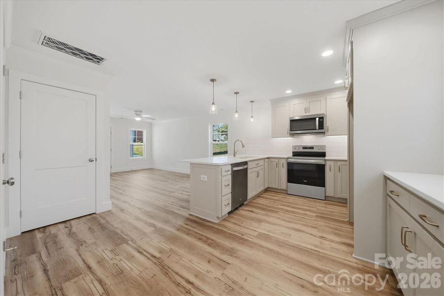 Furnished interior view inside a new home in , Statesville (Image 7).