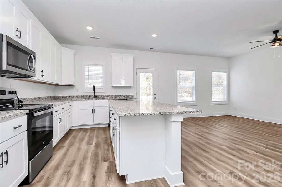 Furnished interior view inside a new home in , Monroe (Image 7).