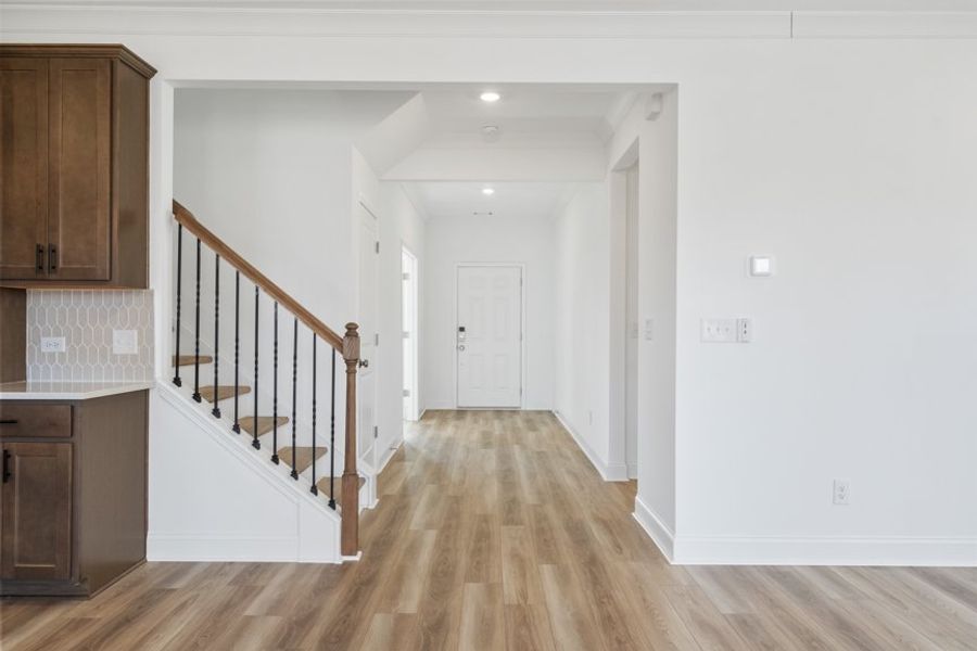 Representative unfurnished interior of a home built from the Ingram by Taylor Morrison in Falls Creek, Flowery Branch (Image 32).