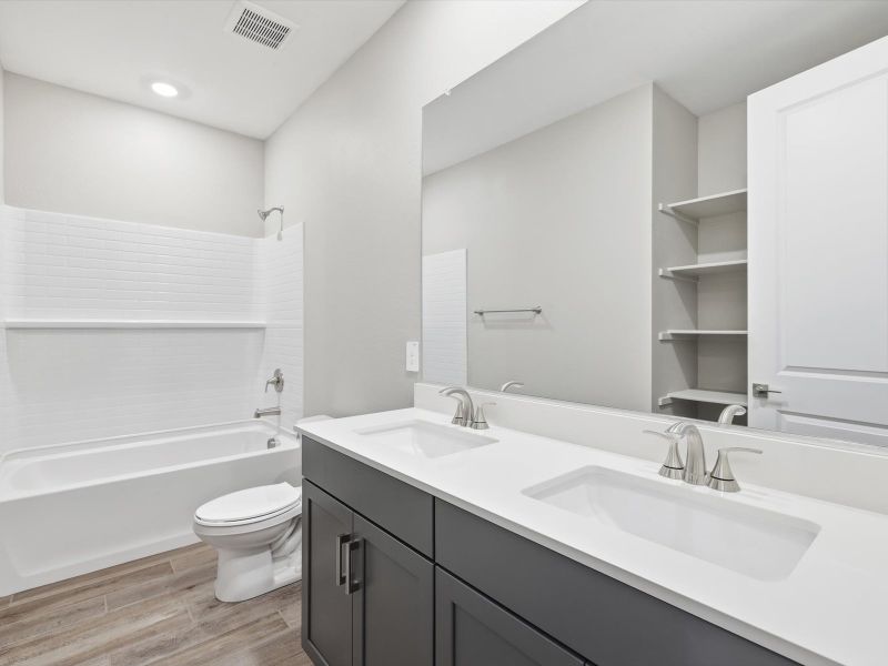 Furnished interior view inside a new home in Legacy Place, Glendale (Image 6).