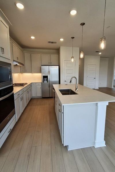 Furnished interior view inside a new home in Wolf Ranch, Georgetown (Image 10).