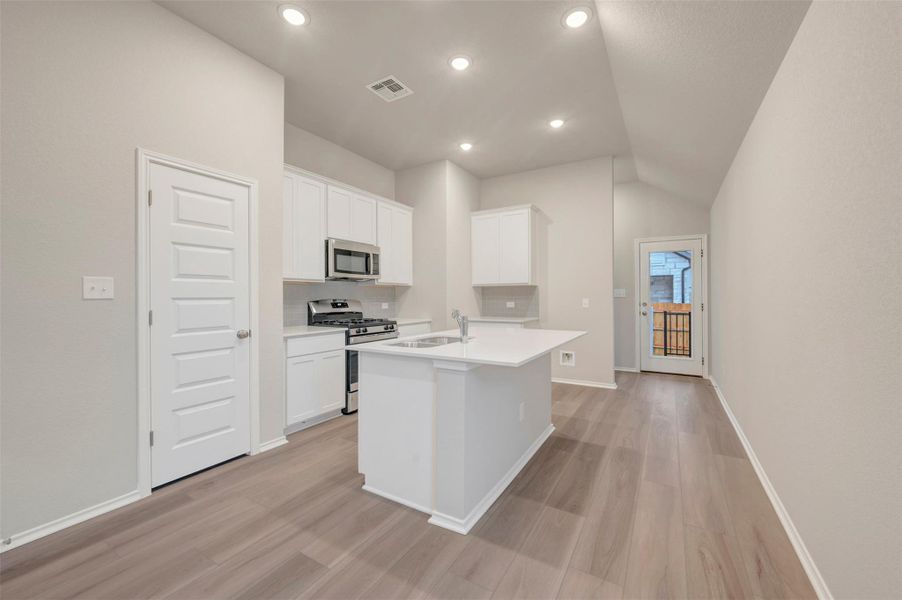 Furnished interior view inside a new home in Heritage, Dripping Springs (Image 6).