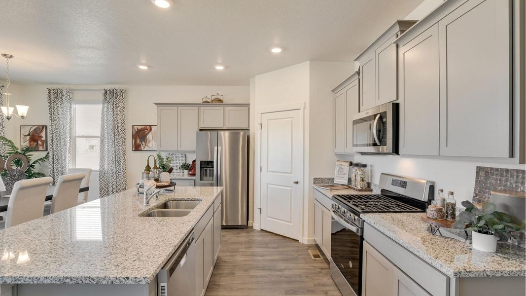 Representative furnished interior of a home built from the Chatham by D.R. Horton in Sky Ranch, Watkins (Image 10). Representative furnished interior of a home built from the Chatham by D.R. Horton in Sky Ranch, Watkins (Image 10).