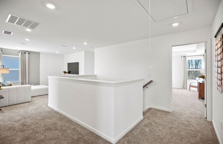 Representative furnished interior of a home built from the Marshall by Pulte Homes in Riverstone, Monroe (Image 38).