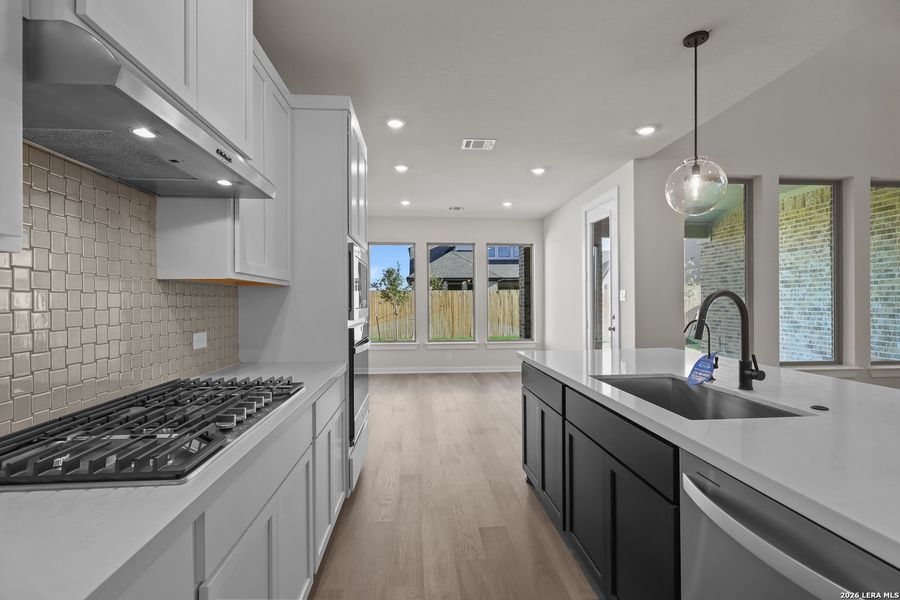 Furnished interior view inside a new home in Nopal Valley, San Antonio (Image 11).