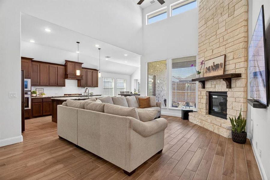 Living room is so airy with soaring ceilings and tons of natural light. Living room is so airy with soaring ceilings and tons of natural light.