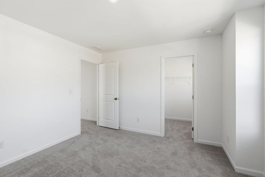 Representative unfurnished interior of a home built from the Norcross by Taylor Morrison in Windance Lake, Loganville (Image 23).