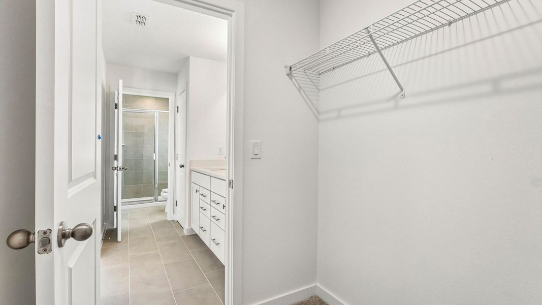 Furnished interior view inside a new home in Cyrene at Harmony, St. Cloud (Image 27).