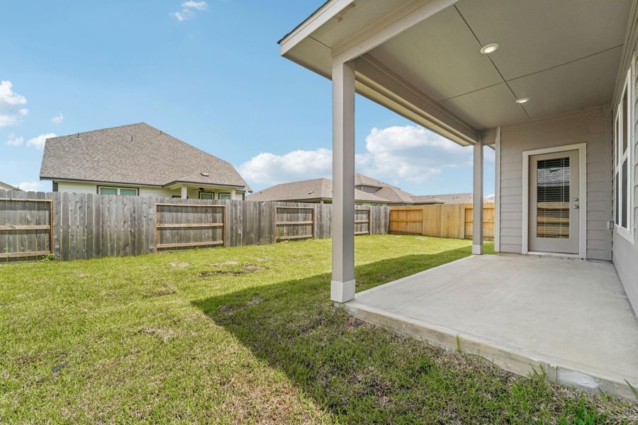 Front exterior of a new home in Heights of Barbers Hill, Mont Belvieu, TX, highlighting curb appeal (Image 2). Front exterior of a new home in Heights of Barbers Hill, Mont Belvieu, TX, highlighting curb appeal (Image 2).