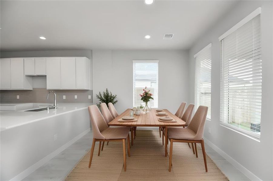 *Virtually Staged* Take another look at this bright dining room!