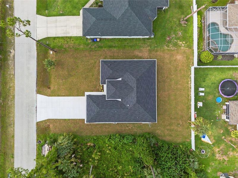 Front exterior of a new home in , North Port, FL, highlighting curb appeal (Image 1). Front exterior of a new home in , North Port, FL, highlighting curb appeal (Image 1).