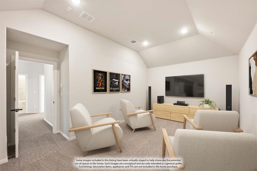 Media room with vaulted ceiling, large wall-mounted TV, surround sound speakers, and neutral carpet flooring