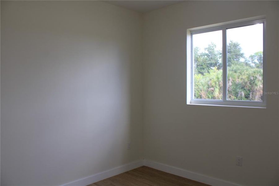 Spacious, unfurnished interior of a new home in , Port Charlotte (Image 49).