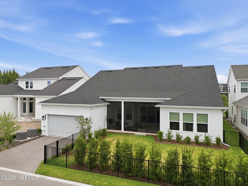 Front exterior of a new home in Seven Pines 70' Rear Entry, Jacksonville, FL, highlighting curb appeal (Image 31).