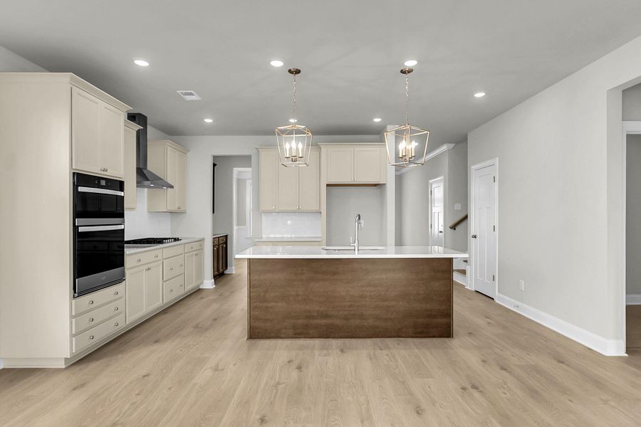 Furnished interior view inside a new home in Tidewater at Lakes of Cane Bay, Summerville (Image 6).