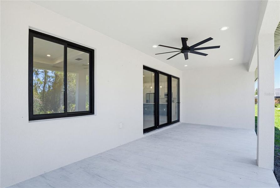 Exterior details and patio area of a home in , North Port (Image 32).