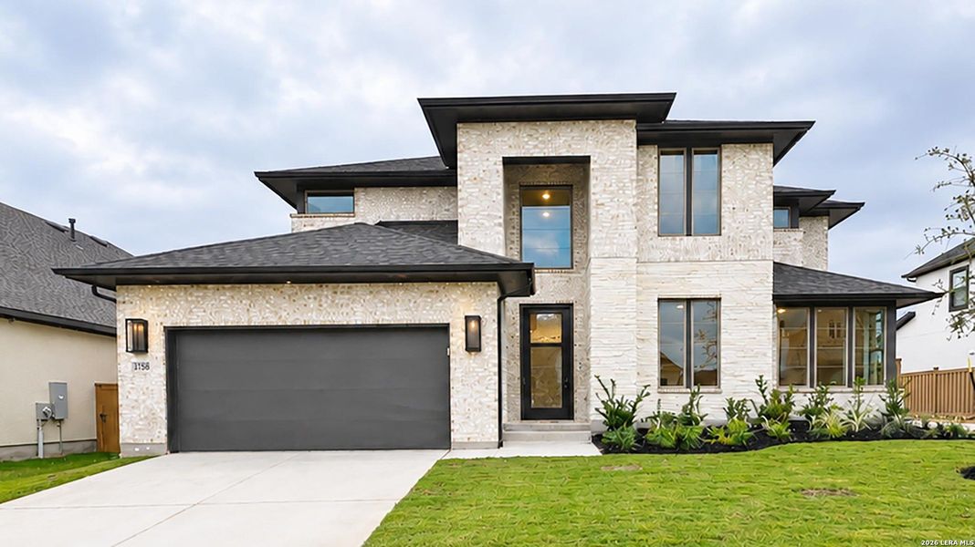 Front exterior of a new home in Mayfair, New Braunfels, TX, highlighting curb appeal (Image 21).