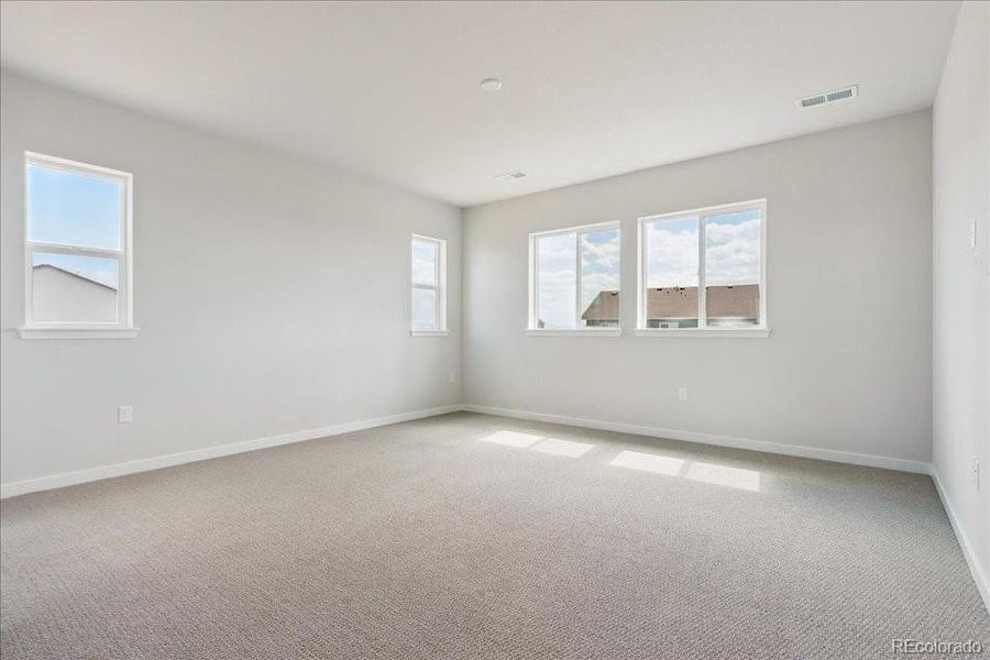 Spacious, unfurnished interior of a new home in Trails at Smoky Hill, Parker (Image 22).