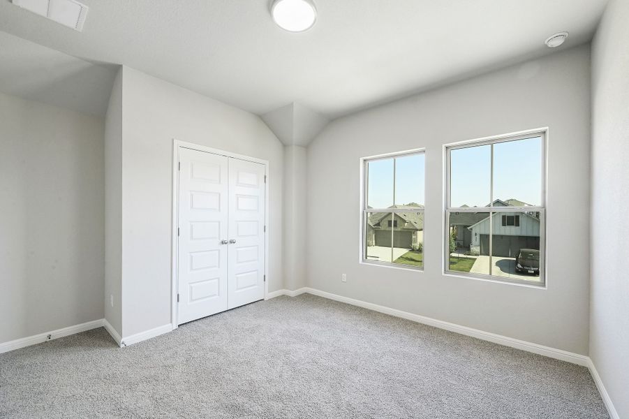 Bedroom in the Willow home plan by Trophy Signature Homes – REPRESENTATIVE PHOTO Bedroom in the Willow home plan by Trophy Signature Homes – REPRESENTATIVE PHOTO