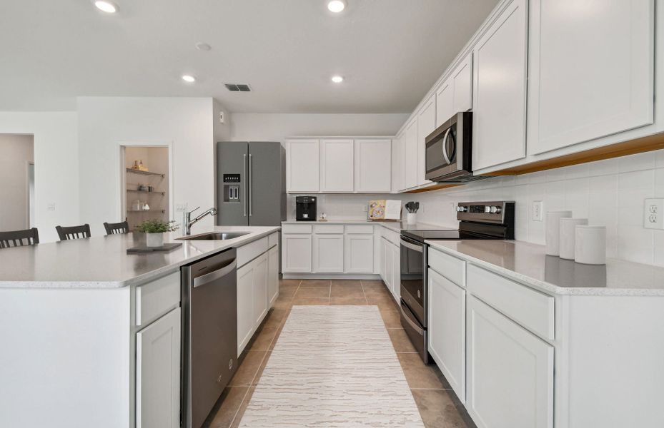 Representative furnished interior of a home built from the Yellowstone 3-Car by Pulte Homes in Caldera, Spring Hill (Image 9).
