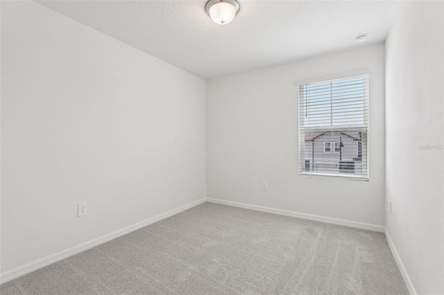 Spacious, unfurnished interior of a new home in Cagan Crossings West, Clermont (Image 30).