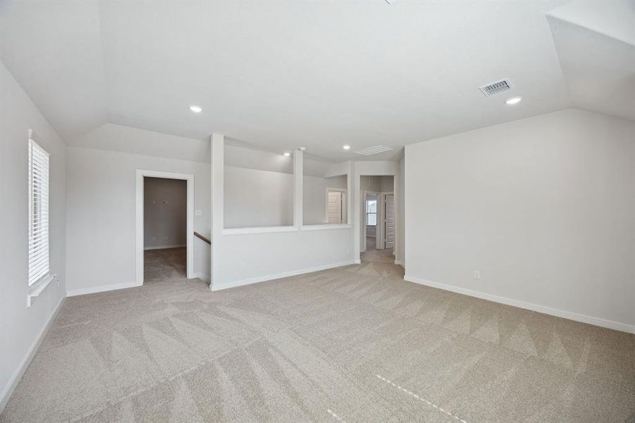 Game room in the Masters home plan by Trophy Signature Homes – REPRESENTATIVE PHOTO Game room in the Masters home plan by Trophy Signature Homes – REPRESENTATIVE PHOTO